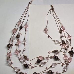 Vintage multi strand light brown stone and faceted plastic pink eaded necklace