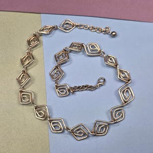 Vintage silver tone triangular wire design link necklace