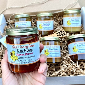 Artisan honey gift box + wooden honey dipper. Six jars of different honey varieties from the NY Finger Lakes region