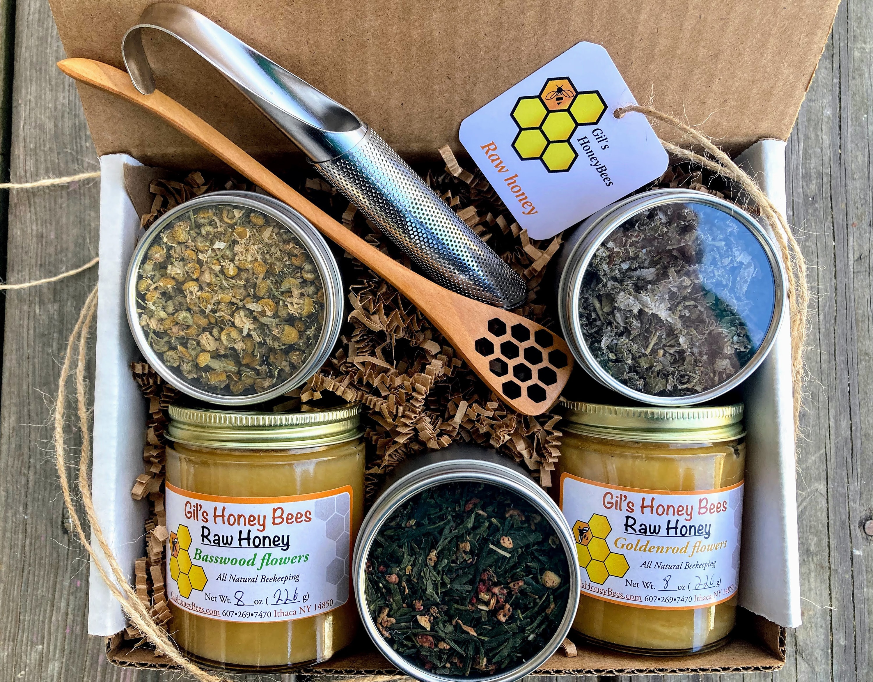 Fair trade organic tea and raw honey gift set. Honey, loose-leaf tea, tea infuser, and honey dipper. Honey and tea gift box