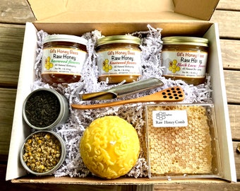 Gift box from the honeybees with real raw honey, pure beeswax candle, raw comb honey, fair-trade organic herbal tea
