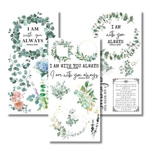 May include: Three white paper prints with floral and botanical designs. The prints feature the text "I AM with you ALWAYS Matthew 28:20" in a circular eucalyptus wreath. Additional prints include floral and botanical elements.