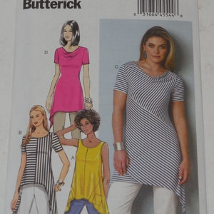 May include: A sewing pattern for a women's top with a diagonal stripe design. The pattern includes four different styles: a sleeveless top, a short-sleeved top with a high-low hem, a short-sleeved top with a diagonal stripe design, and a long-sleeved top with a cowl neck. The pattern is for sizes 6-8-10-12-14. The pattern number is B6058.