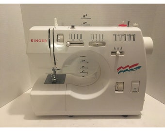 Singer Sewing machine model 30518 with foot petal
