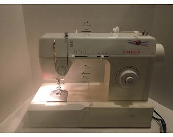 Singer sewing machine model 2517C with foot petal