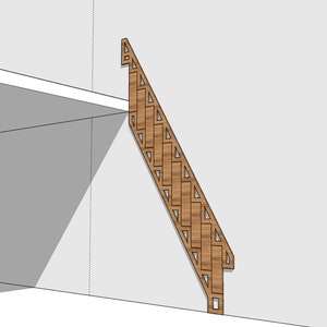 Puede incluir: Una barandilla de escalera de madera con un patrón geométrico repetitivo de triángulos y rectángulos. La barandilla está inclinada contra una pared blanca, con una porción de un techo blanco visible en la esquina superior izquierda. La madera es de color marrón claro natural.