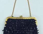 Navy tassle evening bag.
