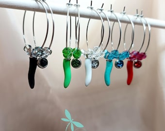 Lucky horn and crystal hoop earrings.