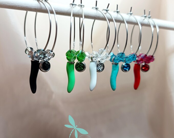 Lucky horn and crystal hoop earrings.