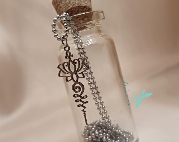 Lotus flower pendant necklace.