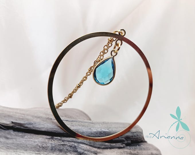 Gold-plated steel necklace with drop pendant.