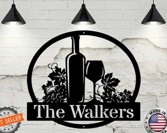 May include: Black metal wine bottle and glass silhouette with grapes and vines. The text "The Walkers" is on a banner below the design. "Made in the USA" is on a red, white, and blue American flag.
