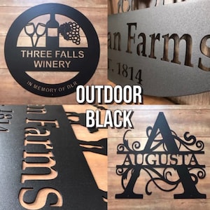 May include: Black metal outdoor signs with cut-out designs. One sign features a winery theme with a bottle, grapes, and glasses. Another displays "Smith Farms" and the year 1814. The third sign says "Augusta". The word "Outdoor" and "Black" are also in the image.