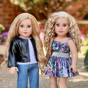 18 inch doll outfit includes black faux leather jacket, blue jeans, white blouse with silver pearl necklace, silver shoes, colorful leotard and matching skirt.