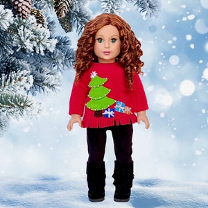 May include: A red doll sweater with a green felt Christmas tree and colorful felt presents. The doll is wearing black pants and brown boots.