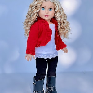 May include: A doll with long blonde curly hair wearing a red ruffled cardigan, a white tank top with lace trim, black leggings, and black riding boots.