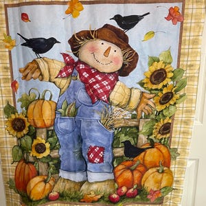 May include: A fall-themed fabric shower curtain featuring a smiling scarecrow in overalls, a plaid scarf, and a brown hat. The design includes pumpkins, sunflowers, blackbirds, and autumn leaves, set against a light blue and yellow plaid background.