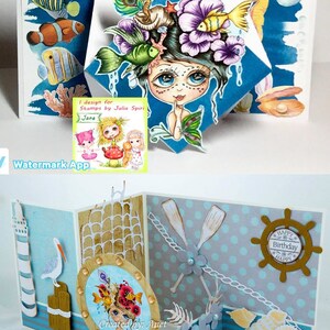 May include: A handmade pop-up card with a blue, white, and gold color scheme. The card features a mermaid with a crown of flowers and a seashell on her head. The card also features a lighthouse, a net, and a steering wheel. The text "Happy Birthday" is on the card.