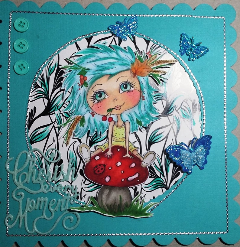 May include: A whimsical illustration of a blue-haired girl sitting on a red and white mushroom with the text "Cherish Every Moment" in green lettering.