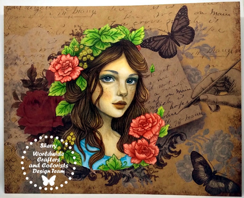 May include: A detailed illustration of a woman with long brown hair, adorned with a floral crown and red roses. Butterflies and handwritten script are in the background. The image includes the text "Sherry Worldwide Crafters and Colorists Design Team."