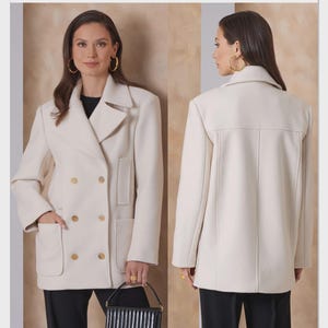 May include: A cream-colored double-breasted coat with gold buttons, front pockets, and a notched collar. The Vogue Patterns logo is visible in the upper right corner. The coat is shown from the front and back.