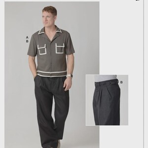 May include: McCall's M8686 sewing pattern featuring a short-sleeve button-up shirt with a camp collar, two chest pockets, and contrasting white trim. The pattern also includes pleated trousers with a side buckle detail, shown in dark gray.