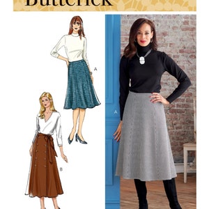May include: A sewing pattern for a skirt with three different styles. The pattern is from Butterick and the pattern number is B6866. The skirt is shown in three different colors and patterns: teal, brown, and black and white.