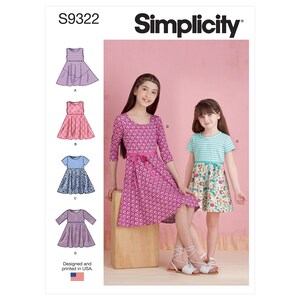 May include: Simplicity sewing pattern S9322 for girls' dresses. The pattern includes four different styles: a sleeveless dress with a gathered skirt, a short-sleeved dress with a gathered skirt, a long-sleeved dress with a gathered skirt, and a short-sleeved dress with a contrasting top and skirt.