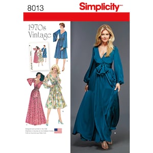May include: Simplicity sewing pattern number 8013 for a 1970s vintage wrap dress. The pattern includes four different dress styles, with long sleeves and a wrap bodice. The dress is shown in blue, pink, floral, and teal.