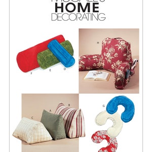 May include: A sewing pattern for making various pillows and cushions for the home. The pattern includes designs for a bolster pillow, a neck pillow, and a wedge pillow. The pillows are shown in different fabrics and colors, including red, green, blue, and white.