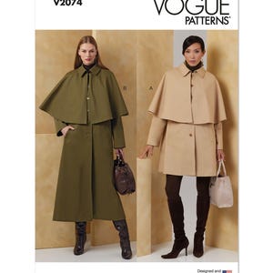 May include: Vogue Patterns V2074. Two women model a cape and coat ensemble. One wears an olive green cape and coat, the other a tan cape and coat. The Vogue Patterns logo is at the top.