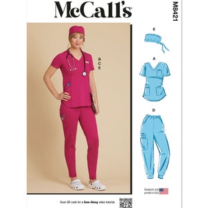 May include: A sewing pattern for scrubs, featuring a pink top and pants, a blue top and pants, and a blue surgical cap. The pattern is McCall's M8421. A QR code is included for a sew-along video tutorial.