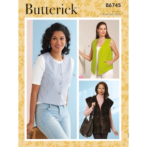 May include: Butterick pattern B6745 features vests in various styles. The image shows a woman wearing a blue and white striped vest with buttons. Other vests include a green vest with pockets and a brown fur vest. The pattern size is Y (XSM-SML-MED).