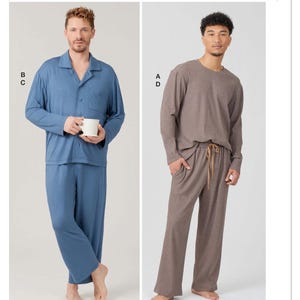 May include: McCall's pattern for sleepwear. The image shows two sets of pajamas. One set is blue, with a button-down top and pants. The other set is brown, with a long-sleeved top and pants with a drawstring. The text "Designed and printed in USA" is visible.
