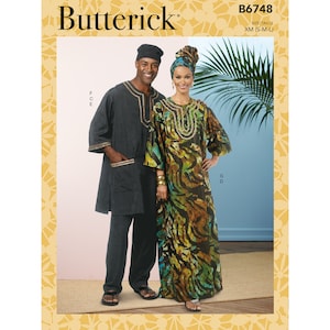May include: A sewing pattern for a long, flowing dress and a matching tunic. The dress is printed with a green, brown, and blue pattern. The tunic is a solid dark gray color. The pattern is for sizes small, medium, and large.