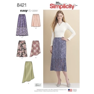 May include: A sewing pattern for a skirt with five different styles. The pattern is from Simplicity and is labeled "easy-to-sew". The styles include a floral print skirt, a plaid skirt, a solid green skirt, a solid pink skirt, and a lace skirt.