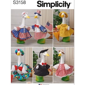 May include: Simplicity pattern S3158 featuring six goose figurines in various outfits. The geese are dressed in outfits such as a graduation gown, a raincoat, and patriotic attire. The pattern is designed and printed in the USA.