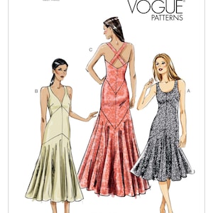May include: A sewing pattern for three different dresses. The dresses are sleeveless and have a V-neckline. The pattern is called Vogue Patterns V8814 and is for A, B, C, D cup sizes.