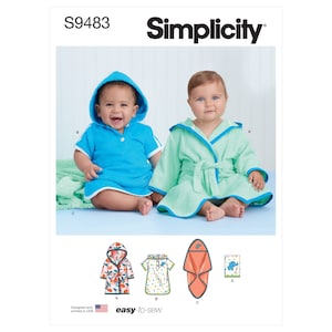 May include: Simplicity sewing pattern S9483 featuring baby hooded bathrobes and a hooded towel. The image shows two babies wearing the robes, one blue and one green. The pattern includes easy-to-sew instructions.