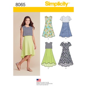 May include: Simplicity sewing pattern number 8065 for girls' dresses. The pattern includes four different styles: a sleeveless floral dress, a short-sleeved denim dress, a sleeveless striped top with a high-low skirt, and a short-sleeved floral dress with a peter pan collar.