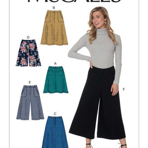 May include: A sewing pattern for six different styles of skirts. The pattern includes a black, a blue, a green, a brown, a plaid, and a floral skirt. The pattern number is M7475.