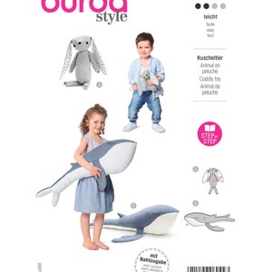 May include: A sewing pattern for making two plush toys: a gray bunny and a blue whale. The pattern includes instructions for sewing the toys and a step-by-step guide. The pattern is labeled "6044" and "leicht" (easy).