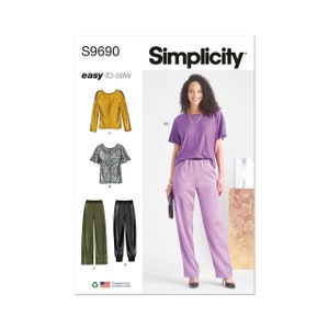 May include: Simplicity sewing pattern S9690, easy-to-sew, featuring a long-sleeved top, a short-sleeved top with flutter sleeves, and a pair of pants. The model is wearing a purple top and pants.