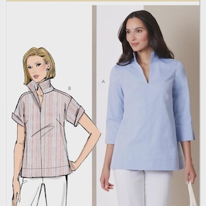 May include: Butterick sewing pattern B7080 features illustrations of two different blouses. One is a light blue, long-sleeved blouse with a V-neck. The other is a short-sleeved, striped blouse. The pattern is designed and printed in the USA.