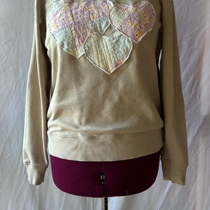 Sudadera de cuello redondo con apliques de patchwork y corazón de patchwork estilo vintage
