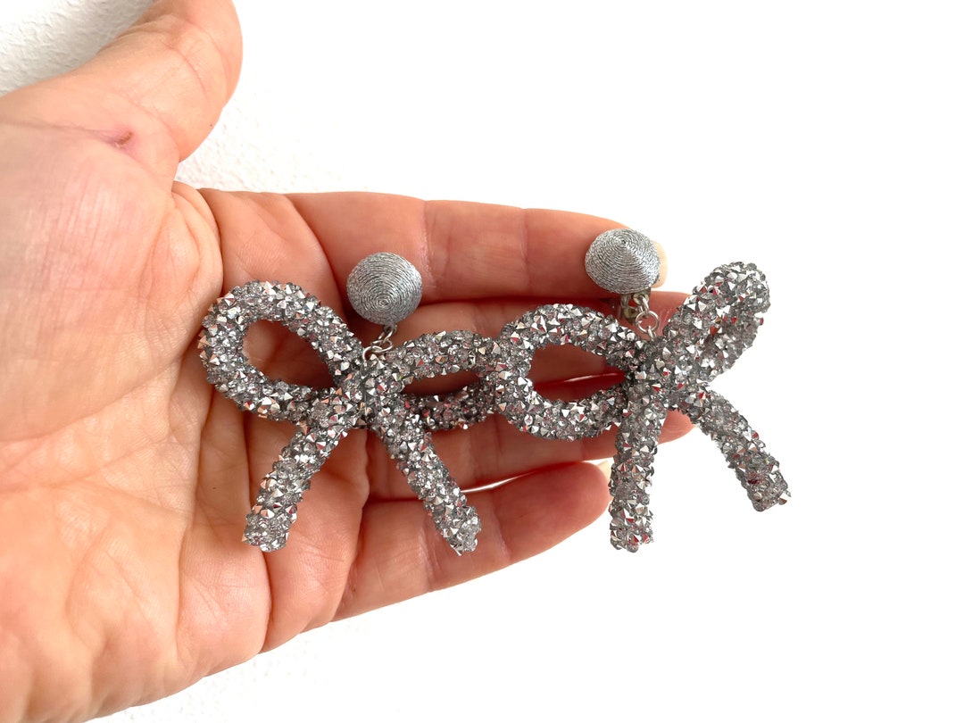ピアス Crystal Bow Drop Clip-On Earrings Silver-Tone Crystal Bow Drop Clip Earrings | Sandy T.H.