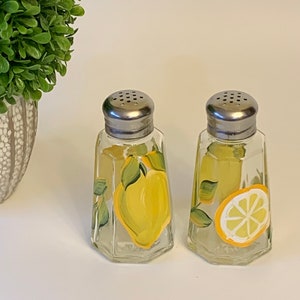 Painted lemons, salt pepper shakers, glass shakers, lemons shakers, painted glass shakers with lemons, stainless tops