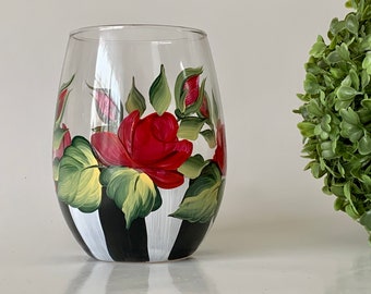 Painted stemless red  roses wine glass. Unique  with white and black stripes. Listing is for one glass. They are 21 oz oversized.