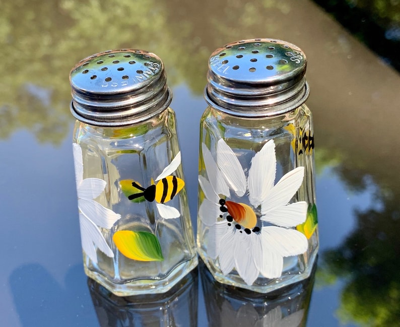 Salt and pepper shakers with daisies and bees hand painted