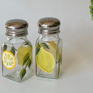 Painted lemons, salt pepper shakers, glass shakers, lemons shakers, painted glass shakers with lemons, stainless tops